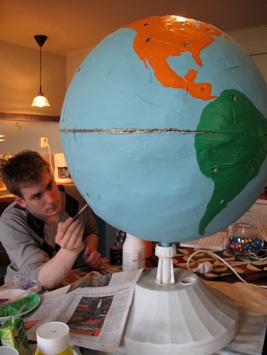 My brother painting the globe